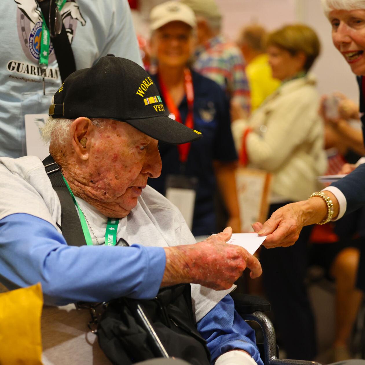 Thank you note handed to veteran at Honor Flight return home.JPG